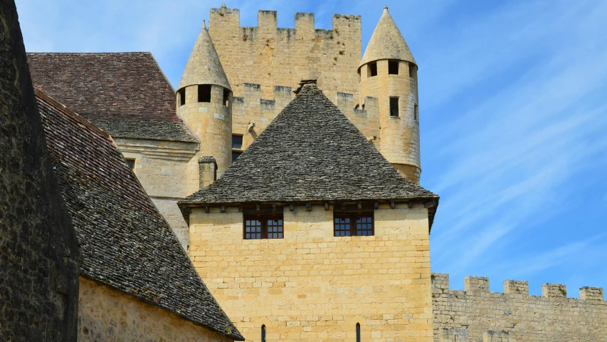 a large castle with a clock on the front of it