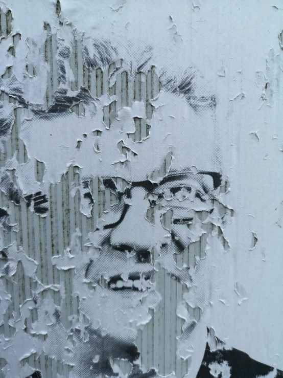 a painting of a man in glasses behind torn up newspaper