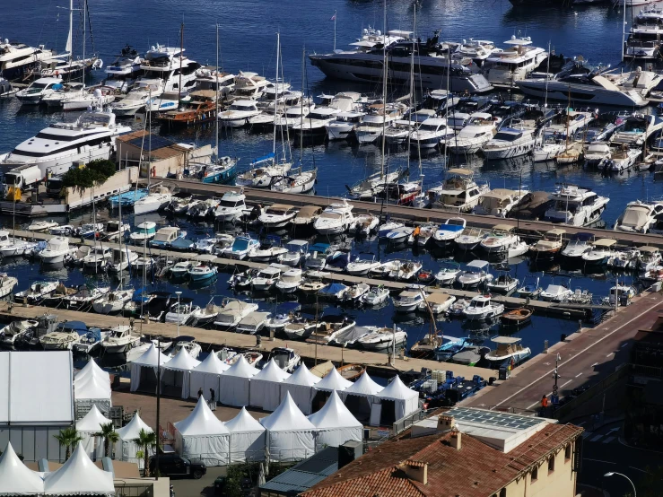 a lot of different boats docked at a harbor