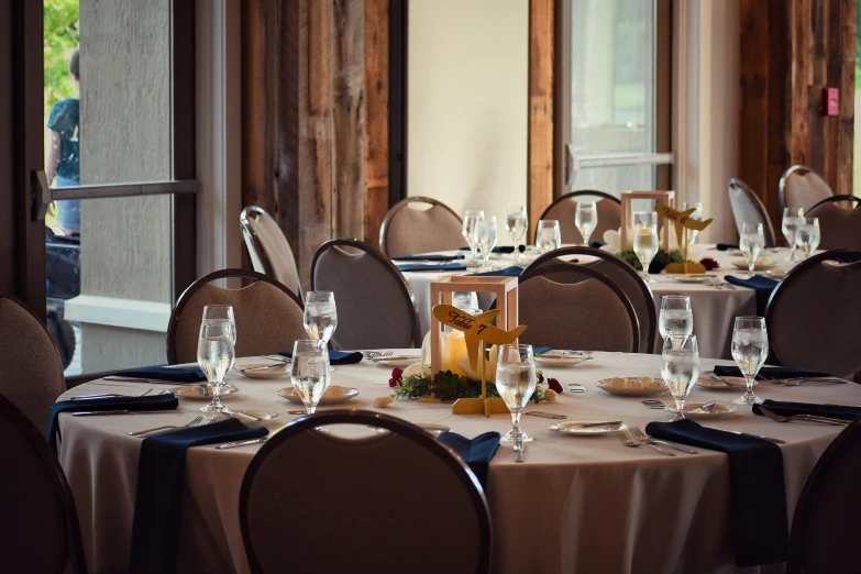 a table set for dinner with place settings