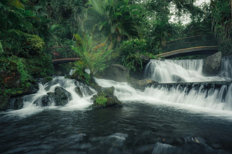 a small waterfall flowing in some water