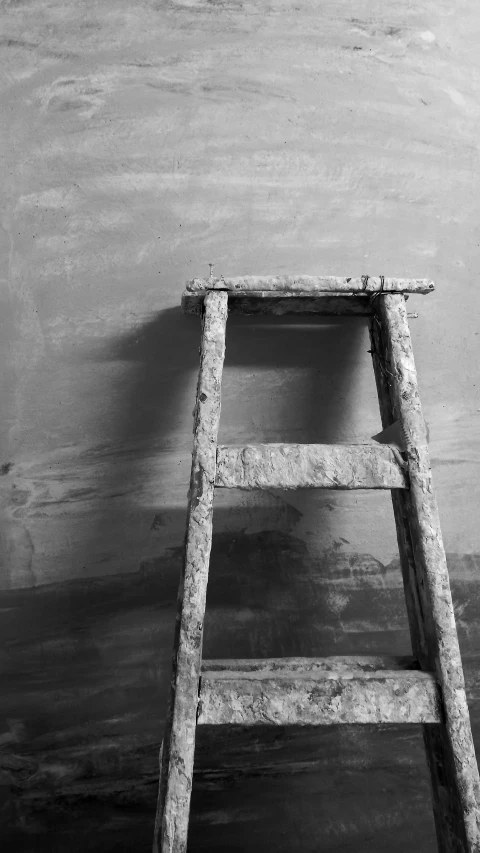 this little stool is made of wood sticks