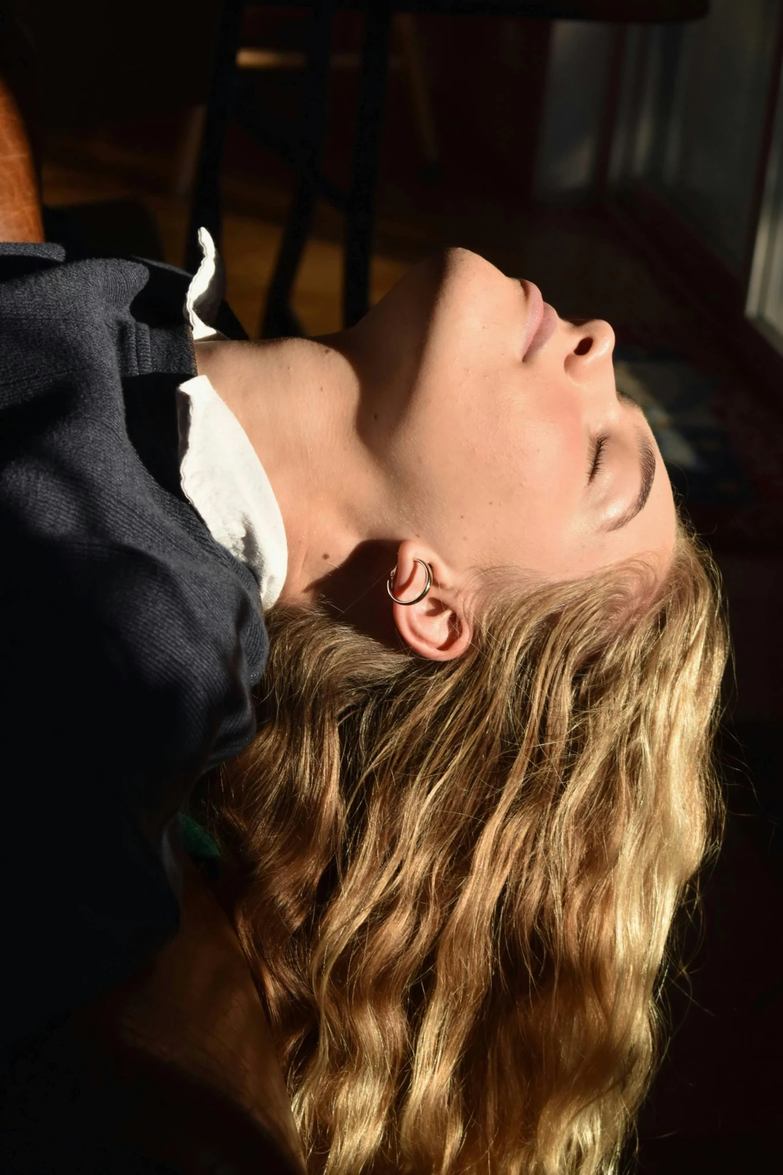 a woman is shown with her head resting on the neck