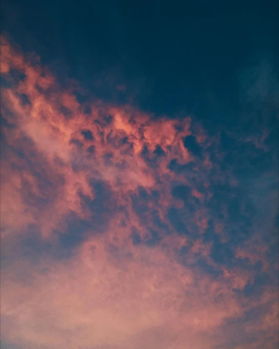 colorful sky during sunset with planes flying overhead