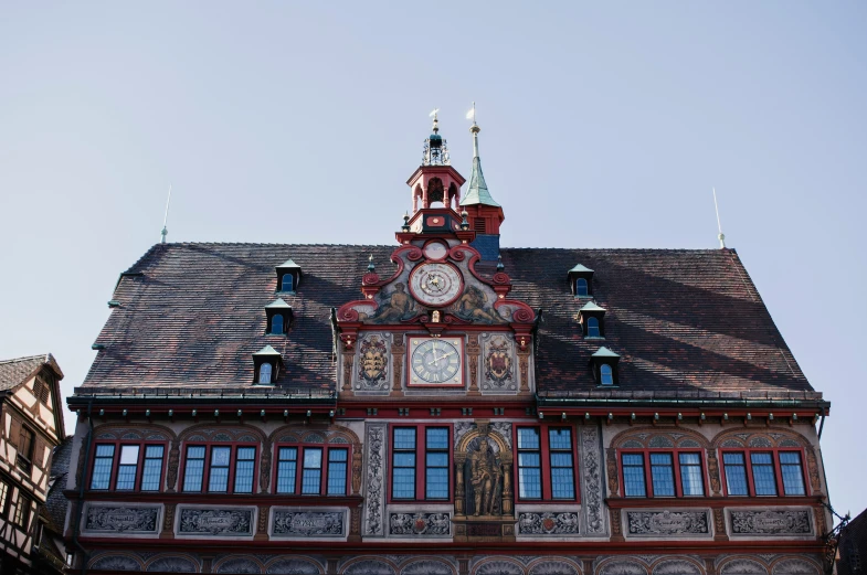 this is a very big clock on top of a building