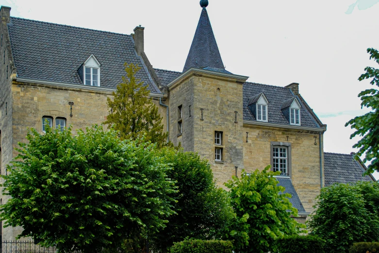 the large building is made of brick with many windows