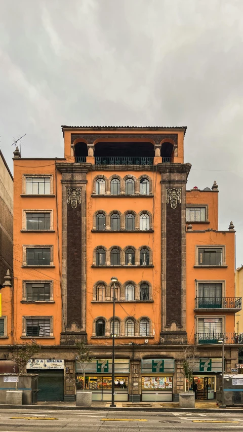 a large brick building with multiple levels of windows