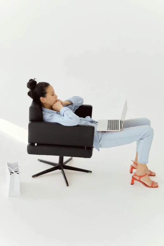 an image of a woman sitting in a chair