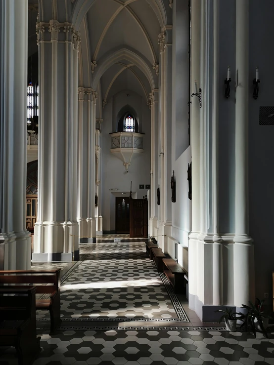 the inside of a cathedral looking toward a choir