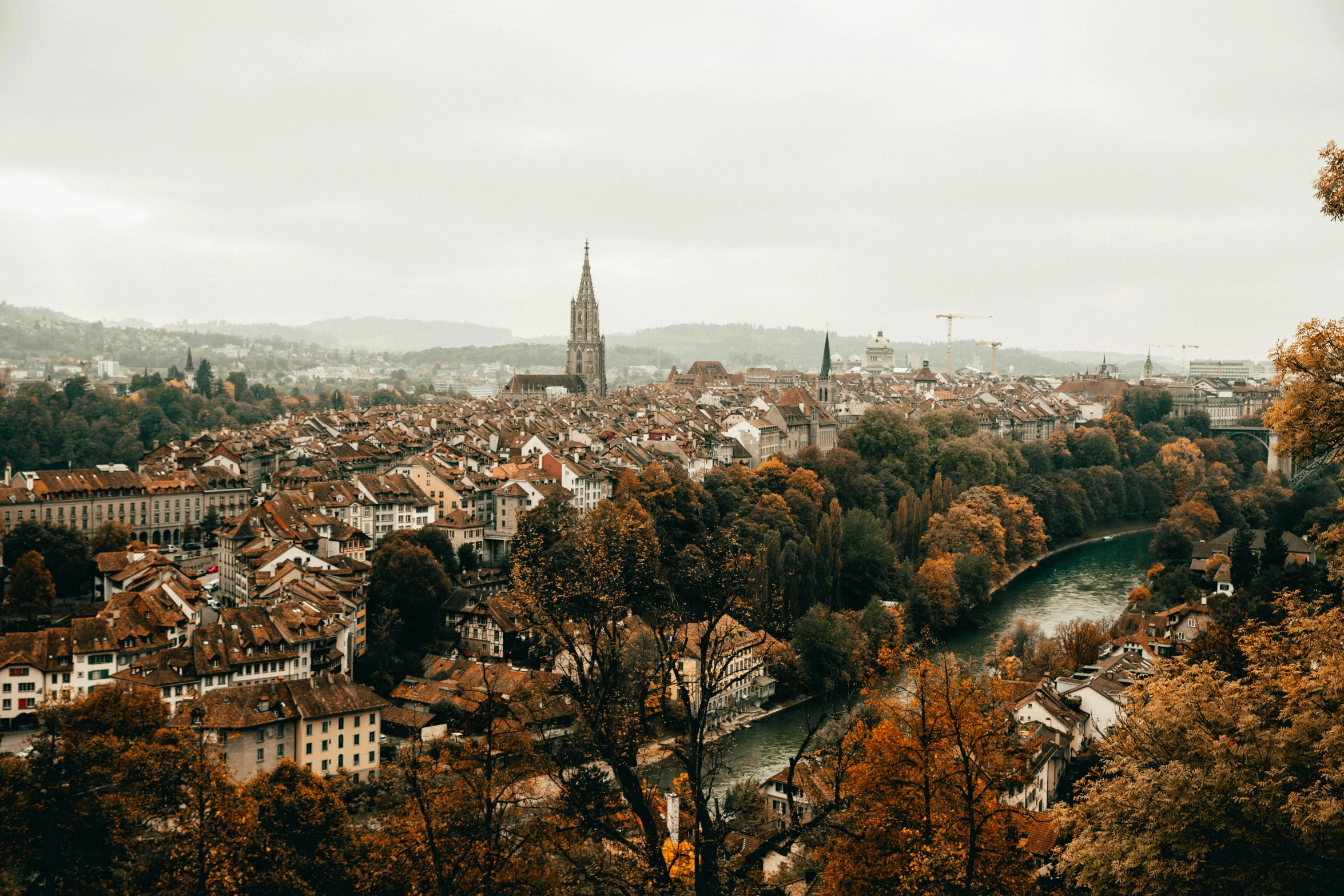 a village with a river next to it