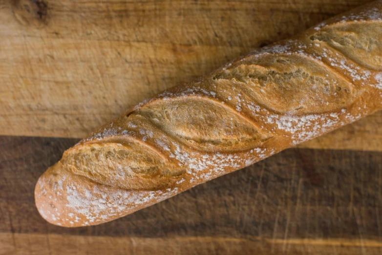 a loaf of bread with some powdered sugar on top