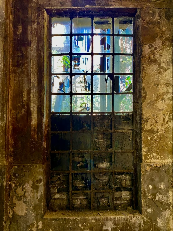 the interior window of an old, run down building