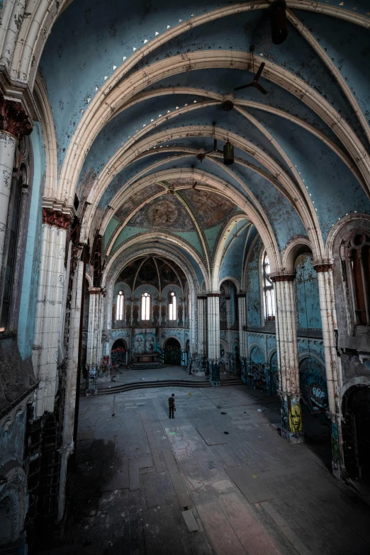 an empty building with two doors and a window