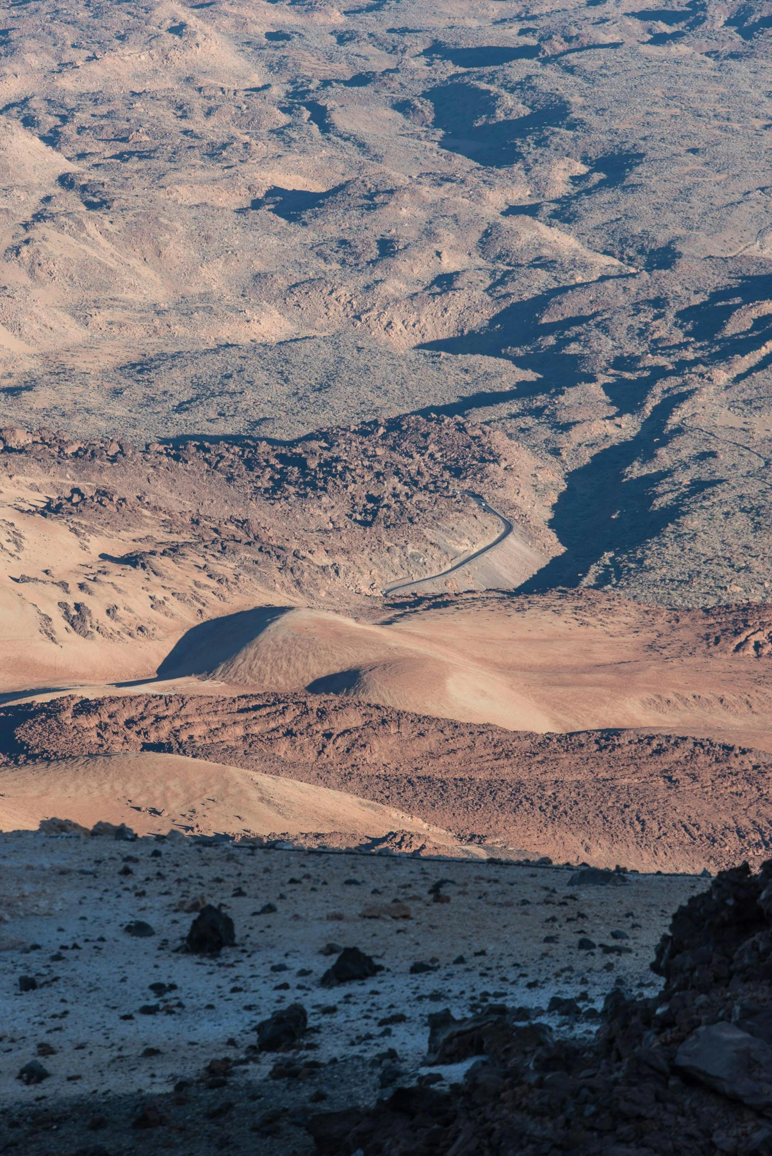 view from the top of a high mountain near a desert