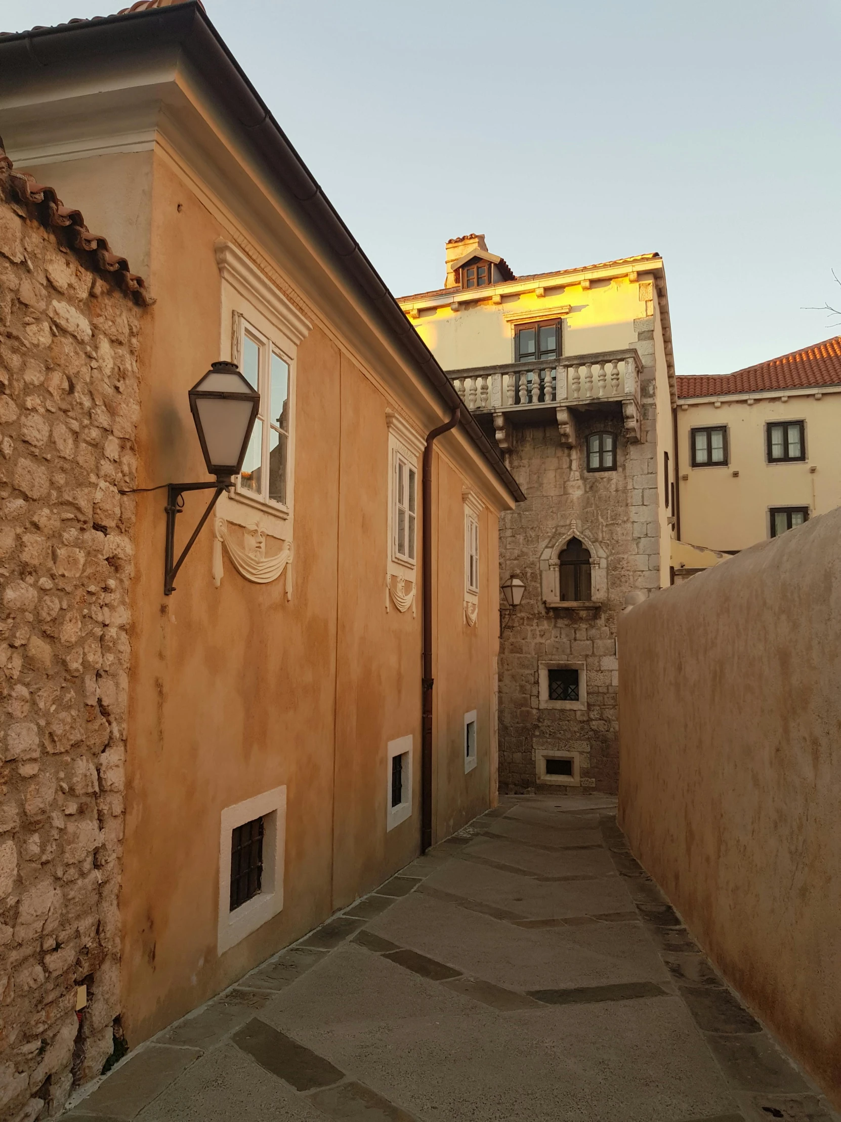 a sidewalk near many buildings is shown