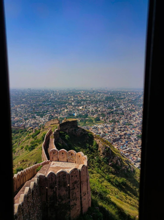 view from a tower in the middle of a mountain