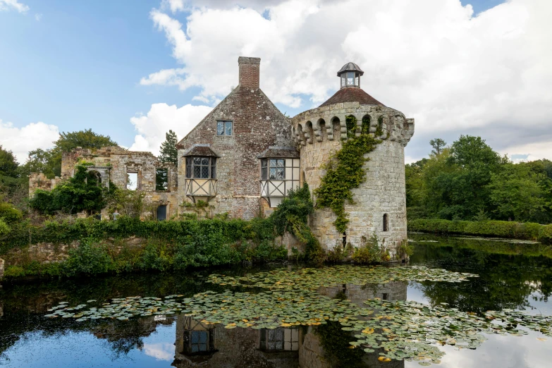 the large castle is made of stone and has many windows