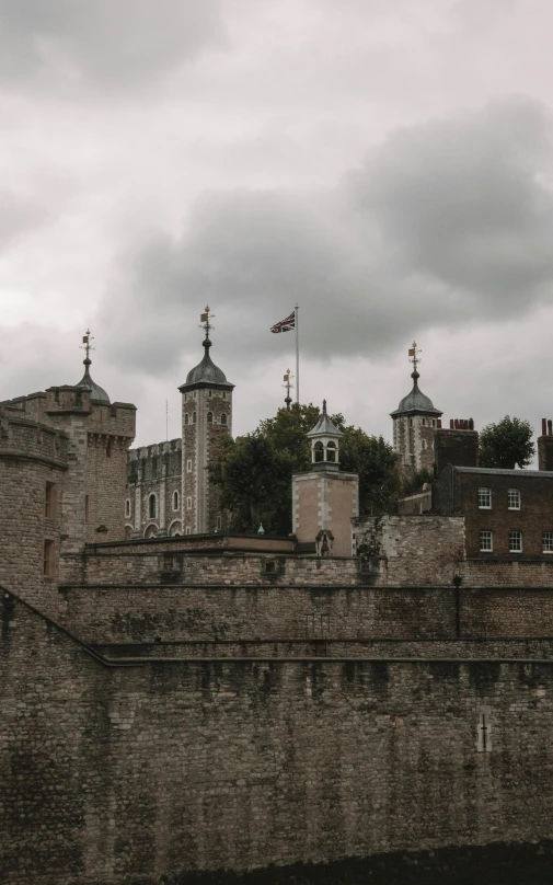 view of an old brick castle with spires