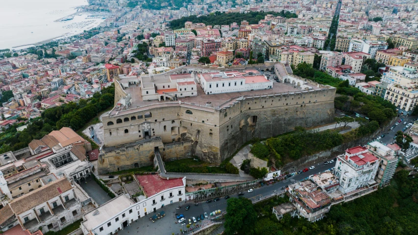 the old city with a huge castle is in the middle of town