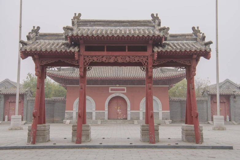 a view of a building with pillars and towers