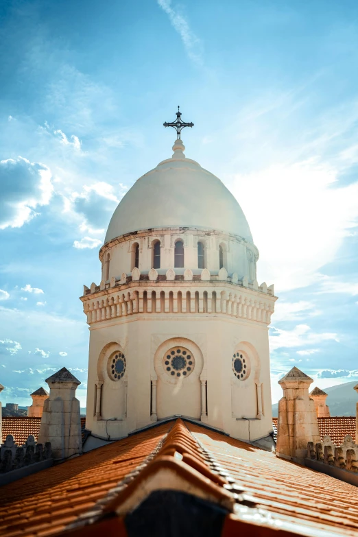 a church dome with a cross on top