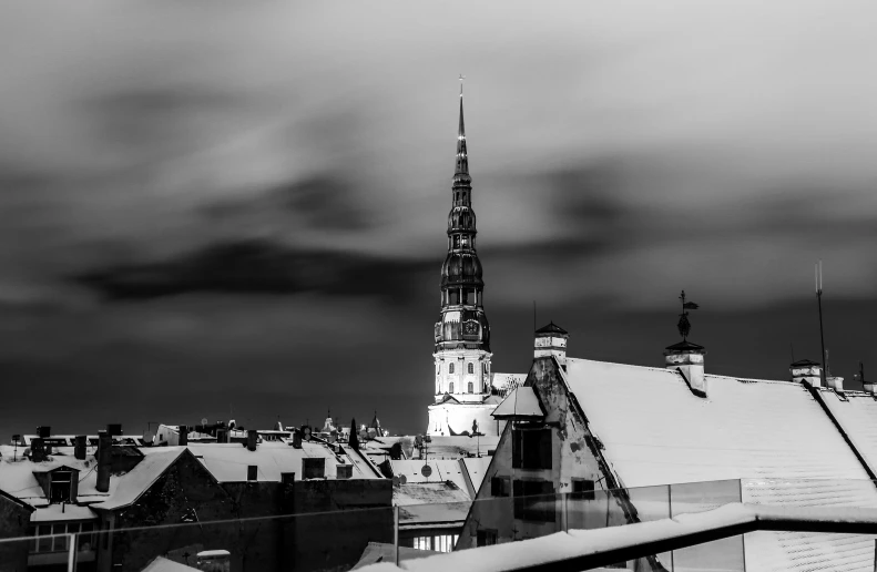 the black and white image is of a snow - covered rooftop in new york