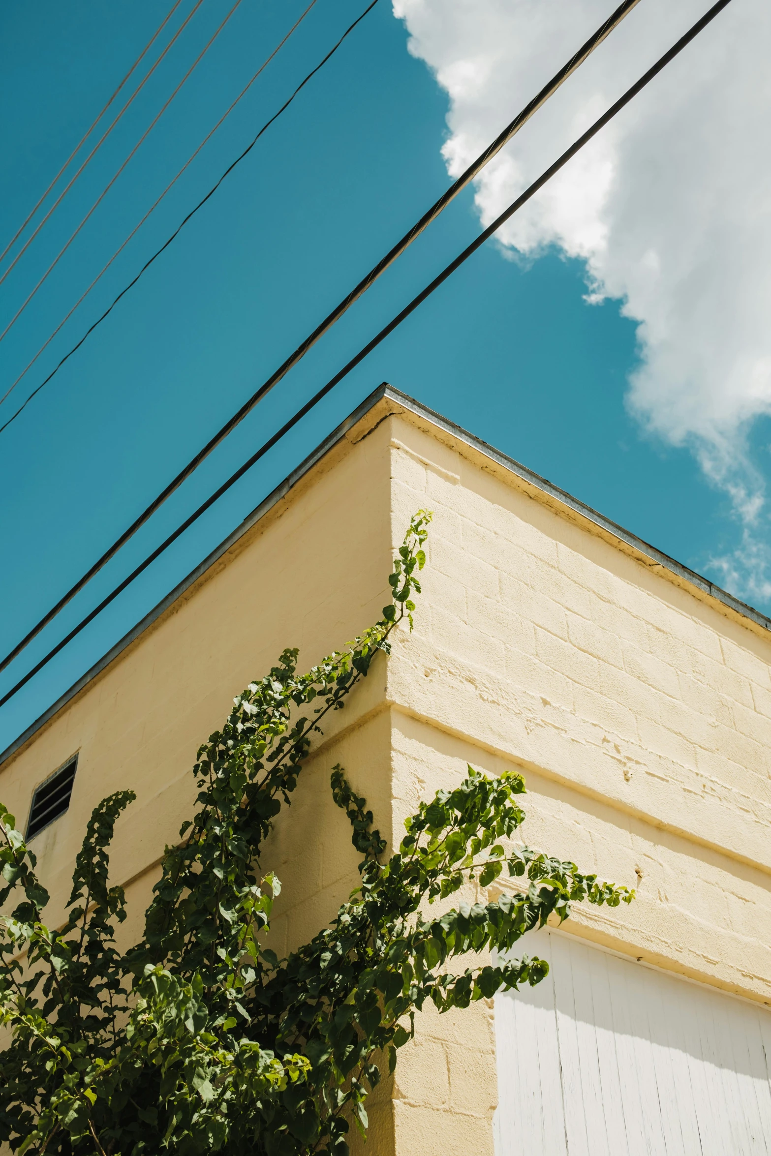 a building with a telephone pole above it