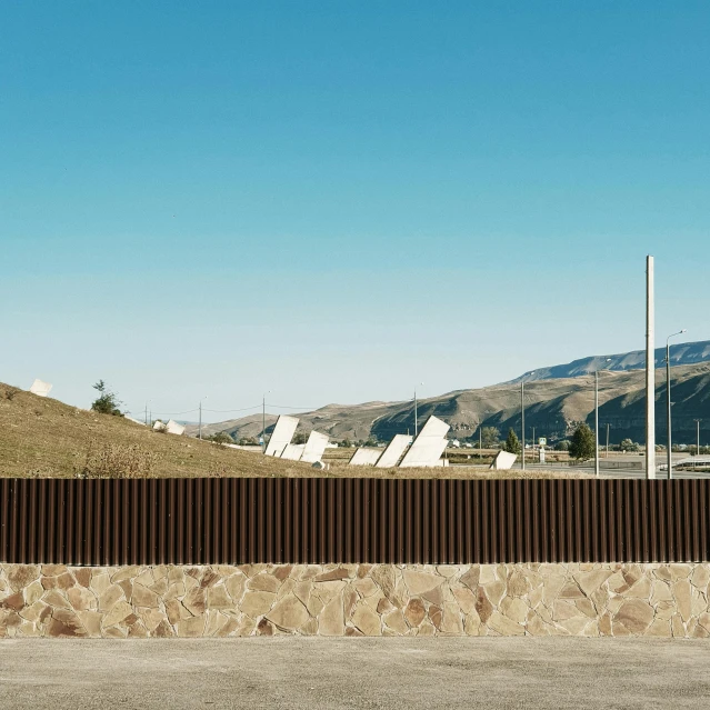 a fence on the side of the road