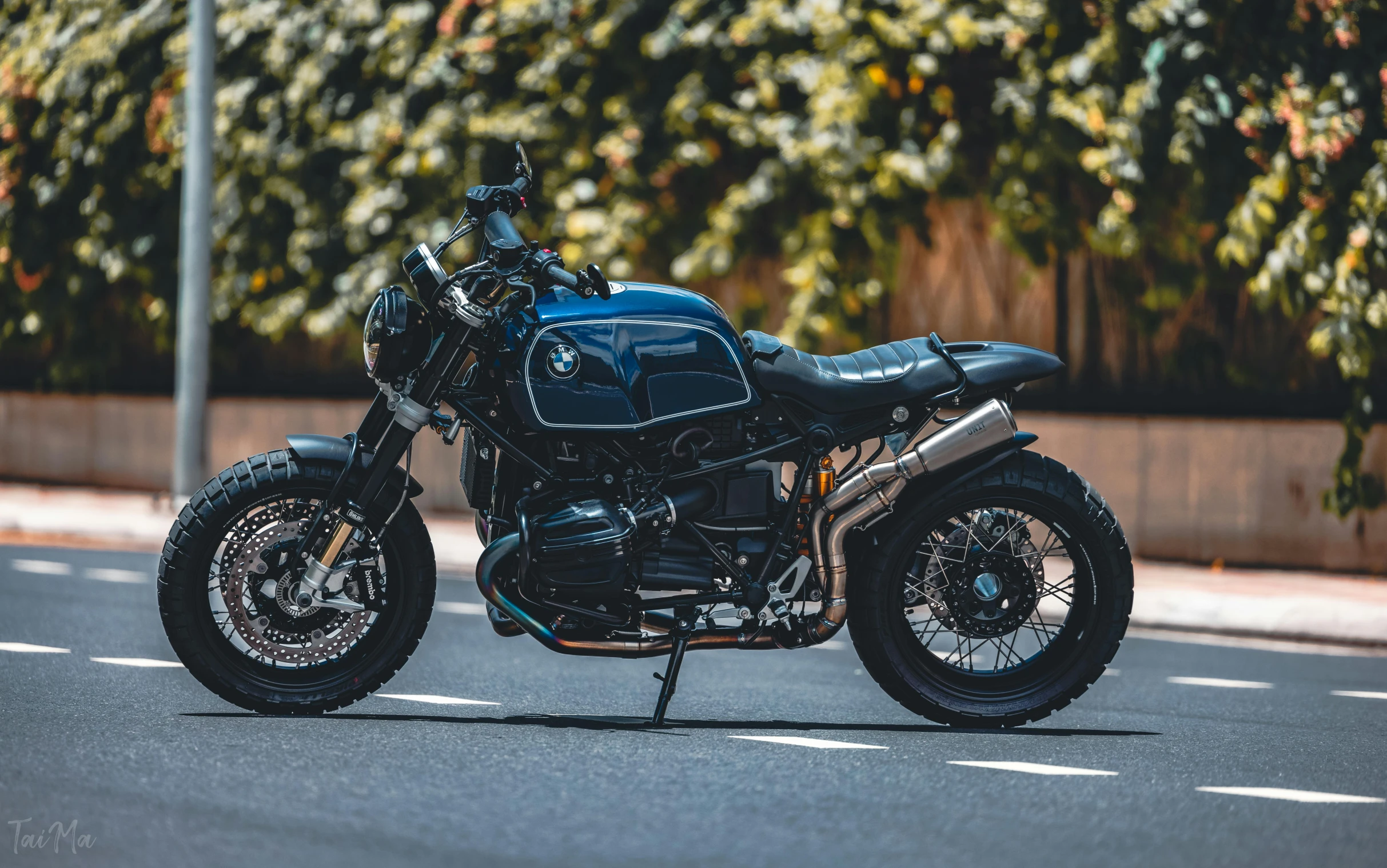 a motorcycle parked on the side of a road