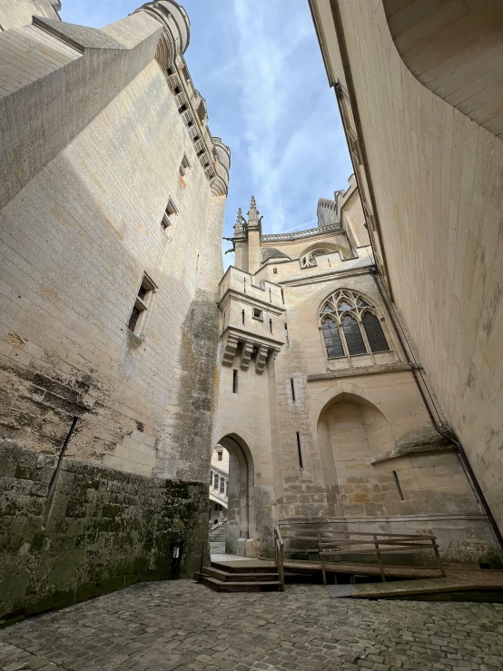 a po looking up at a castle courtyard