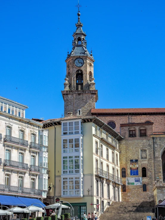 an image of a town center with many buildings