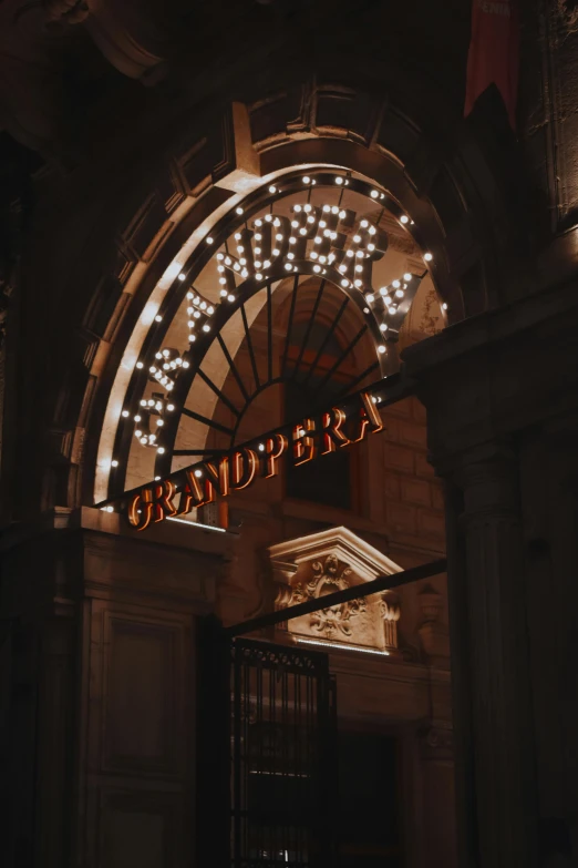 an arched doorway leads to the entrance to a building