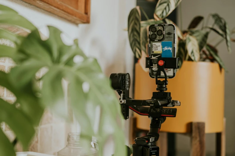 a cell phone attached to a tripod