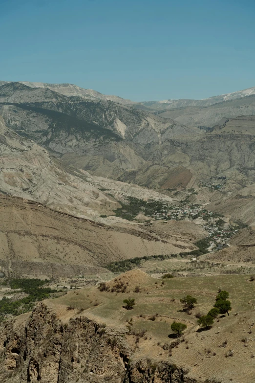 mountain view with some rocks and hills on either side