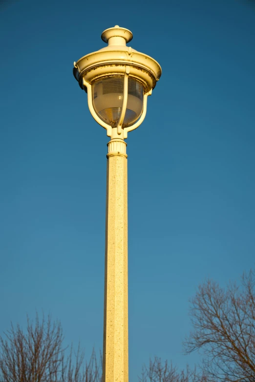 this is an image of a golden pillar in the middle of the sky