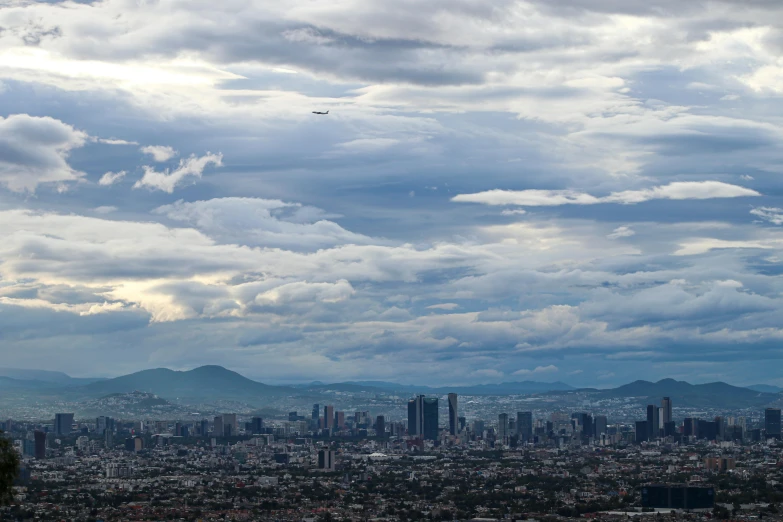 view of skyline and mountain under cloudy sky