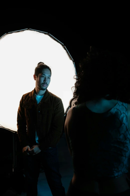 a man that is standing in front of a camera