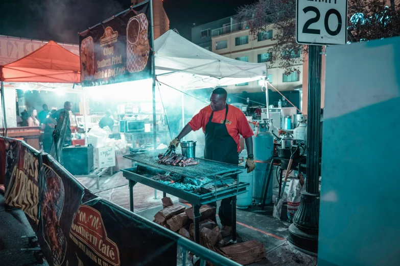 an older man preparing food on top of a grill