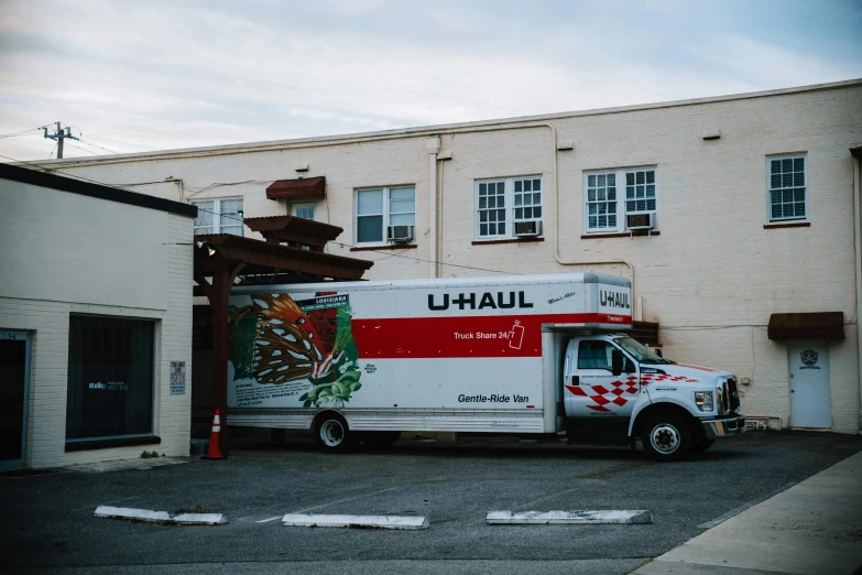 the large truck has a white box on it