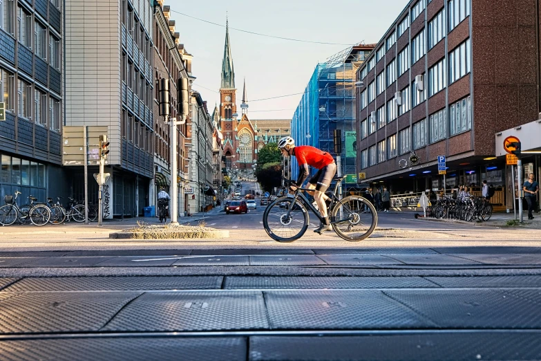 there are three people on bicycles in a city