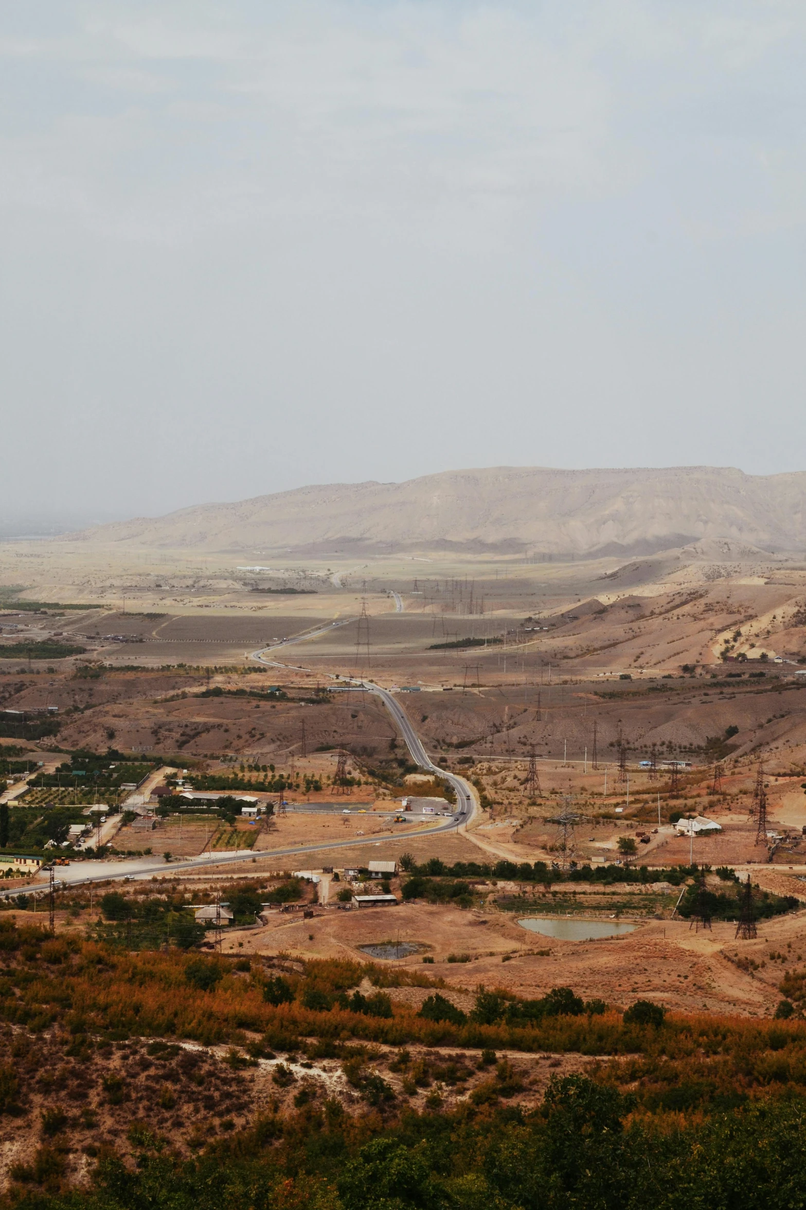 a scenic picture with the road running through the desert