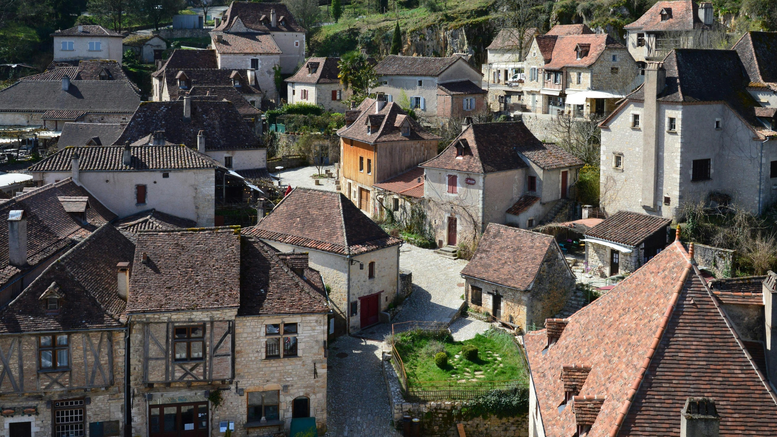 a small town with buildings built on a hillside