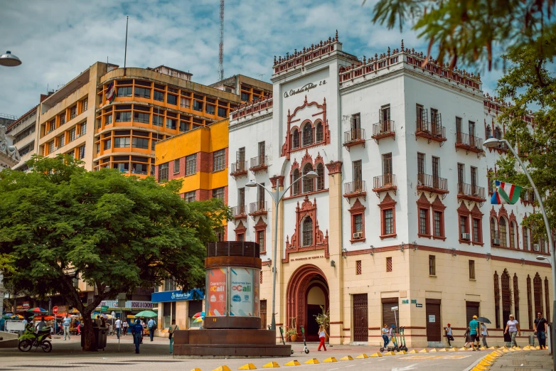 this is a tall building in the middle of a street