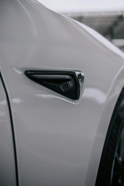 a close up of a door handle on a vehicle