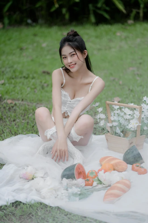 a woman is wearing a white dress and posing for a picture