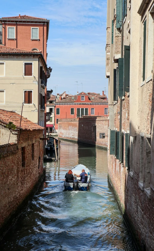 a motorboat floating on top of a river