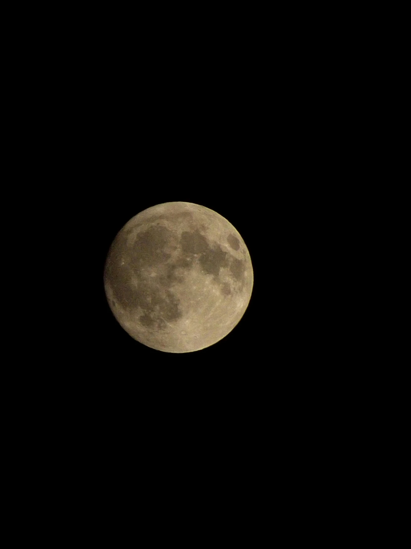 the moon is shown on black, full of clouds