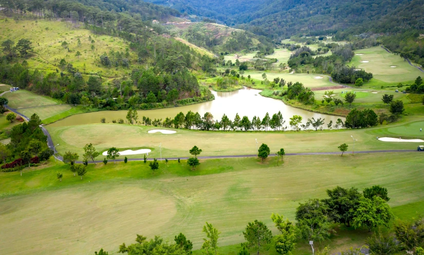 an aerial po of the golf course and surrounding areas