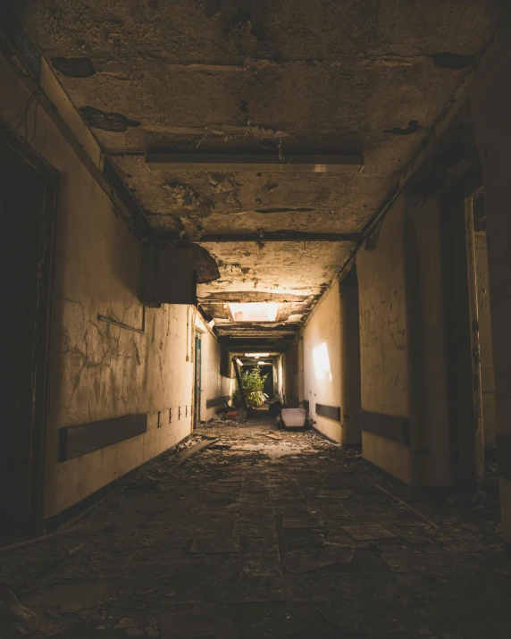 an abandoned corridor with lots of graffiti on the walls and ceilings