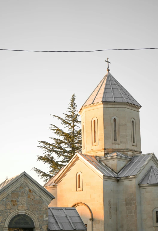 the bell tower and spire on a church